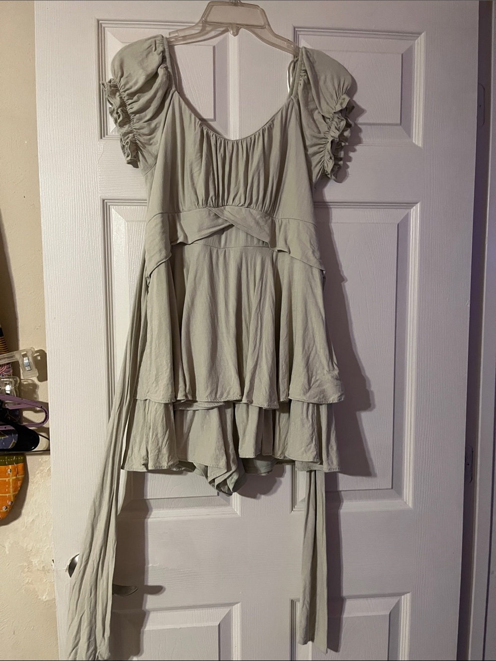 Altar'd State Light Sage Tiered Ruffle Sleeve romper.